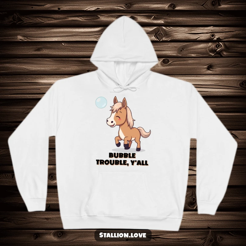 Funny Hoodie with a horse playfully trying to catch a floating bubble, embodying cozy, lighthearted fun.